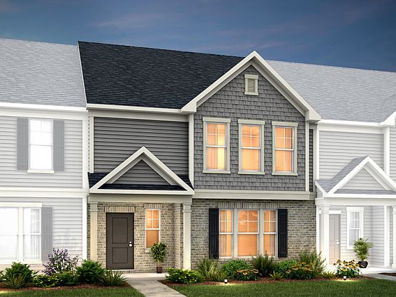 Palmer Exterior 8 features siding, shakes, brick, covered front door and 2 car rear load garage