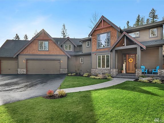 Tahoma School District.  Built in 2014/2015.  Hardi-plank siding on all 4 sides, stone & cedar accents in front. Security & sprinkler systems, high tech cabling, indoor fire sprinklers & A/C.  Hot & cold water on hose bibs in front.  This home is very well appointed & in immaculate condition.