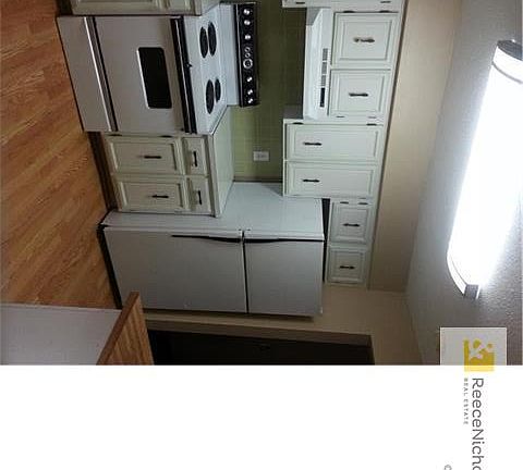 Stove and refrigerator are staying with the home.