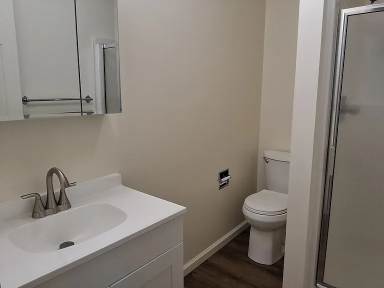 Second shared bathroom offers a large shower new vanity and sink with all new fixtures.