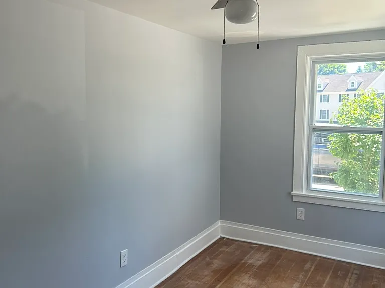 Bedroom #2 with windows on both sides.