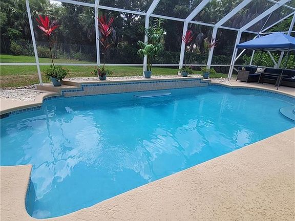 5th image of 2618 NE Sabal Palm Way