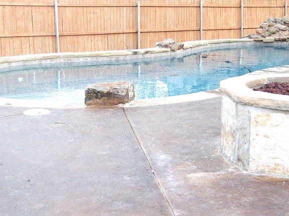 Pool with gas fire pit
