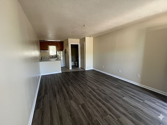 Welcome home! This bright and inviting entry sets the tone for your stylish new studio retreat.