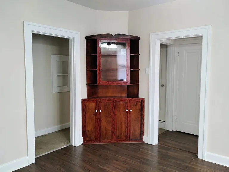 Built in corner China cabinet that sits in the dining room.