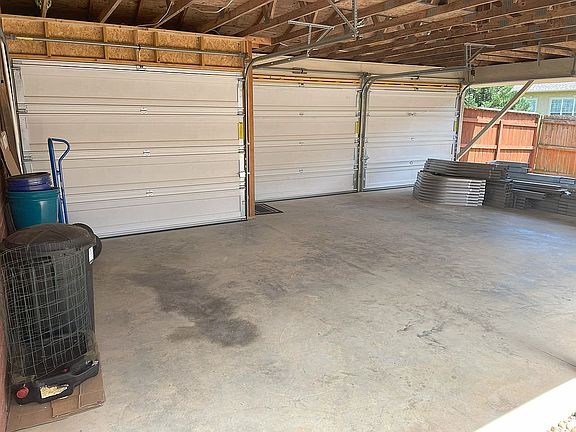 Carport w/ Garage Doors