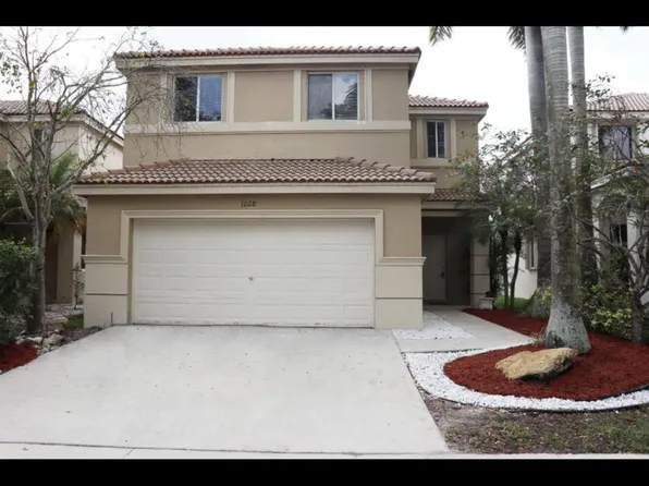 1028 Golden Cane Dr, Weston, FL 33327