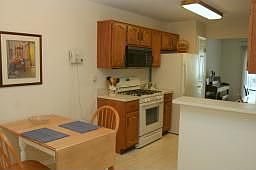 Eat in kitchen with upgraded appliances and pantry