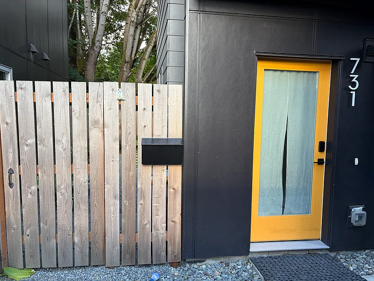 Front door and gate entry to backyard