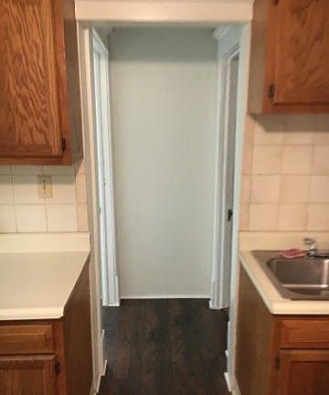 Looking into hallway from kitchen