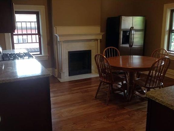Kitchen (~14 x 14) - Cherry cabinets, granite counter tops, and stainless steel appliances .