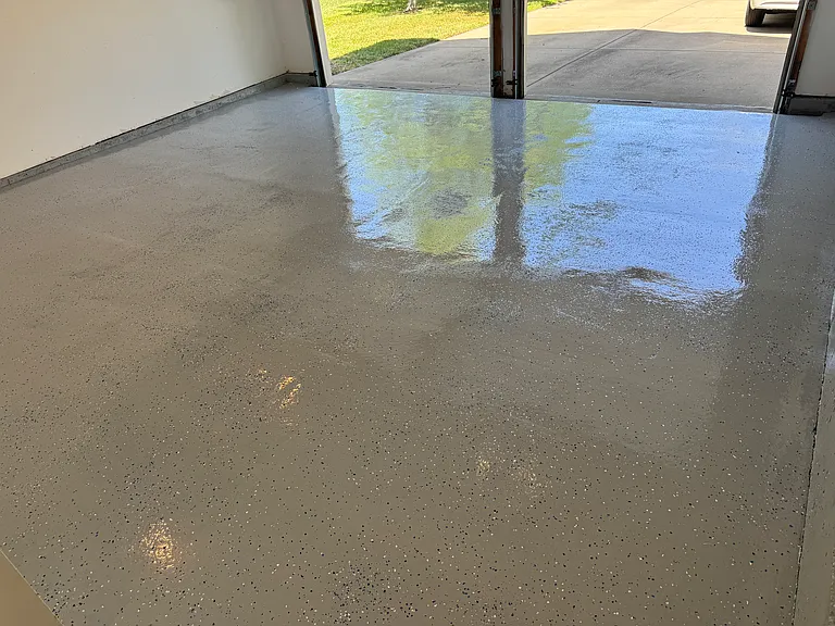 Finished garage with clean epoxy-coated flooring