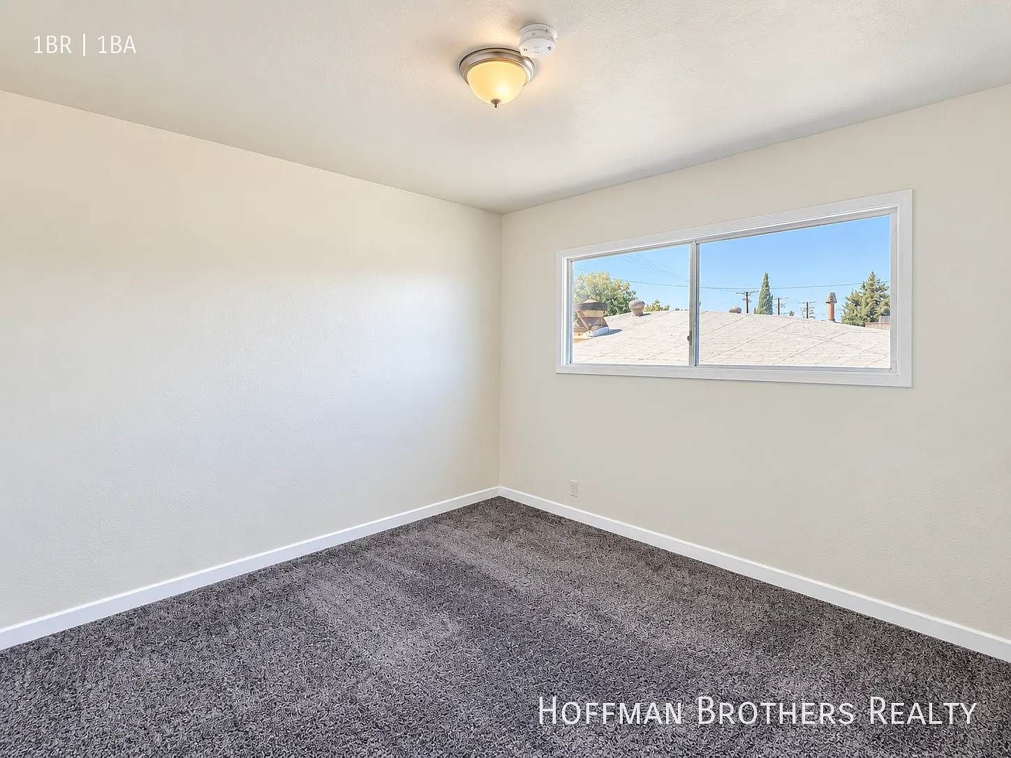 Renovated Upper-Level Apartment with a Fresh, Modern Finish — Photo 4