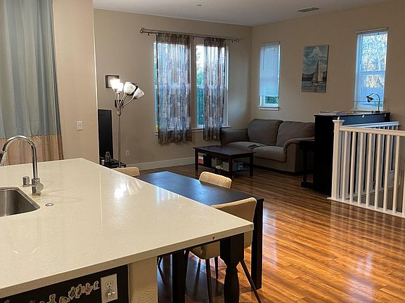 living room with lots of windows, good lighting