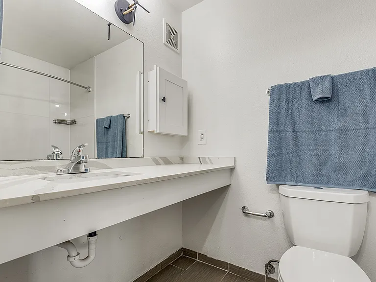 A clean bathroom space with the basics you need for everyday living.