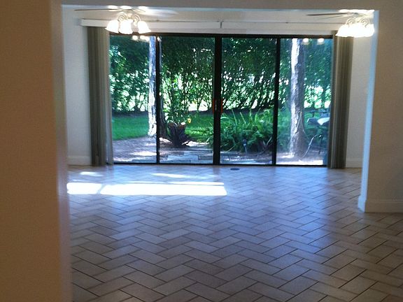 Spacious Lanai opens onto private patio and small backyard great for furbabies!