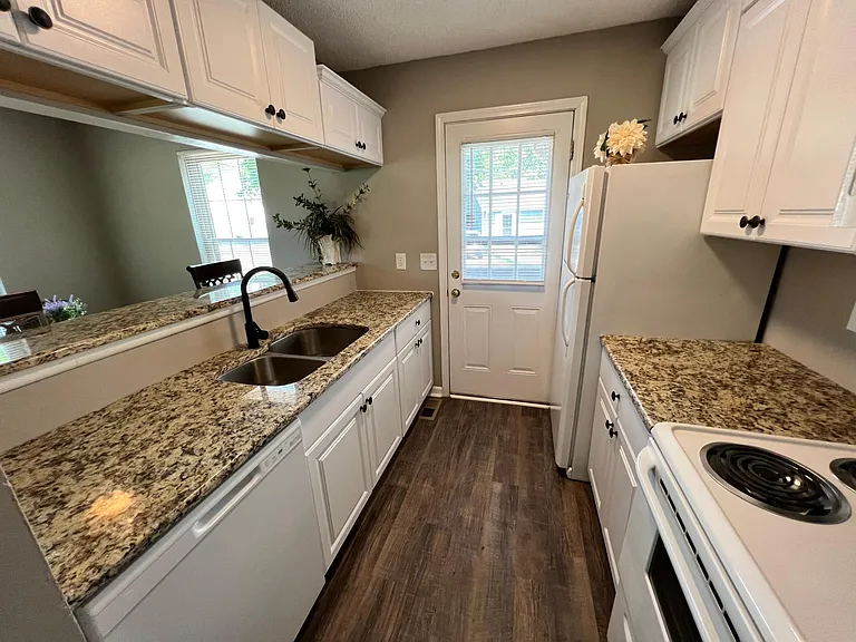 Efficient Galley Kitchen with Frig, Stove/Oven, Microwave & Dishwasher
