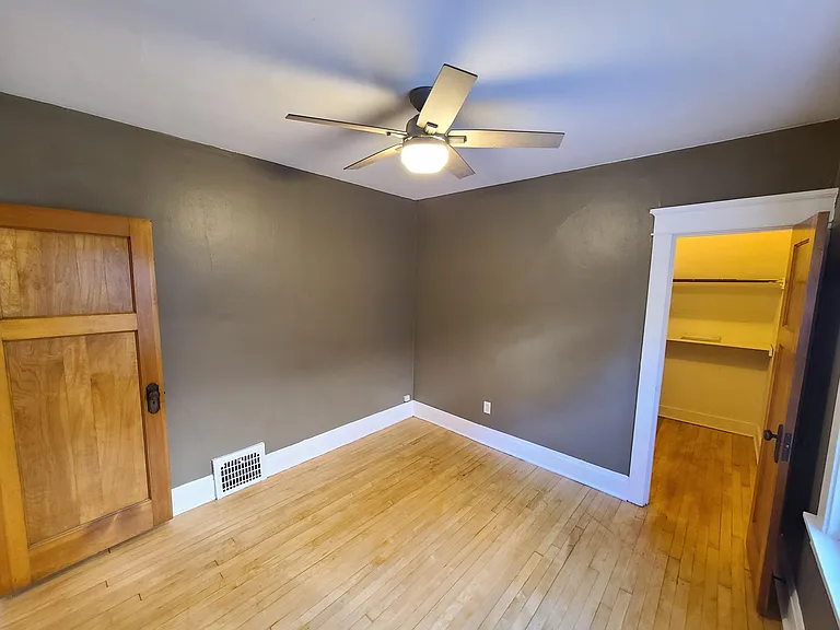Bedroom 1 with walk-in closet.