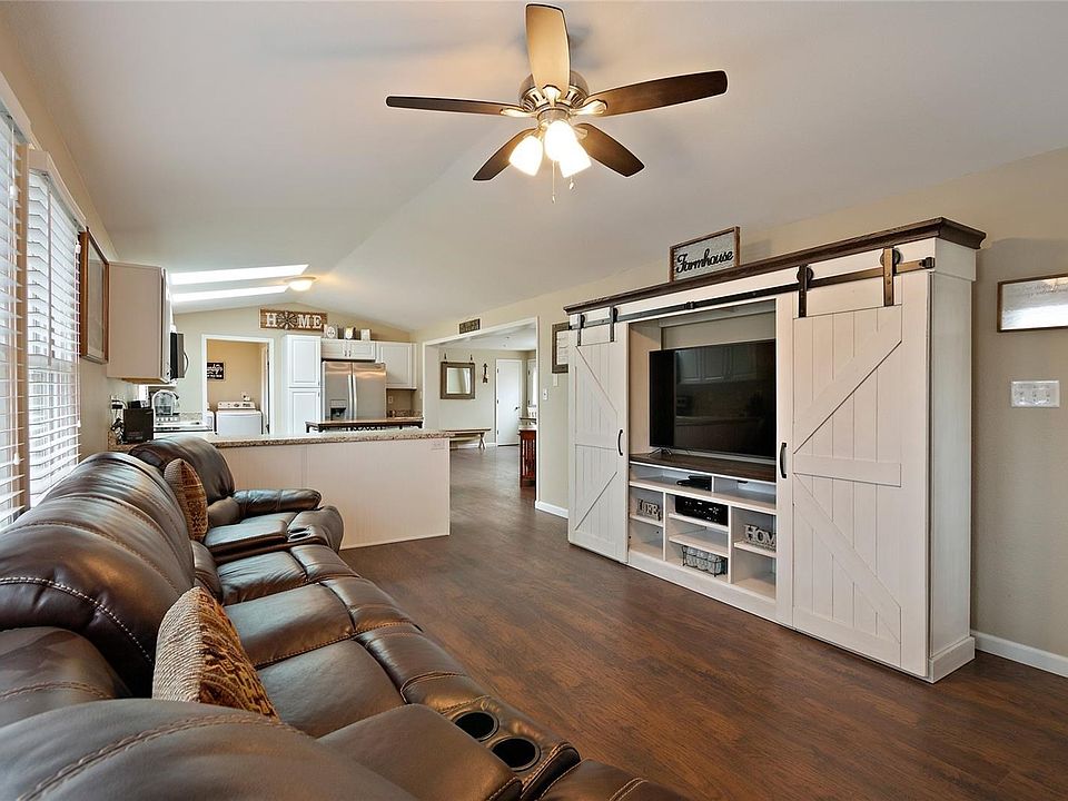 Welcome Home!! The Open Floor Plan and Newer Floors Throughout, Welcomes your Family and Guests to Fun Filled Get Togethers.