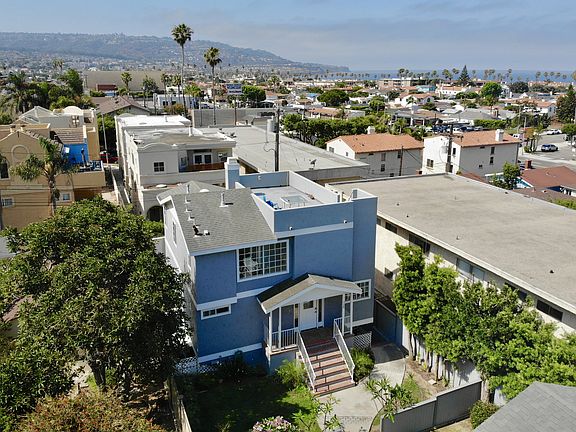 Beautiful home with ocean view rooftop deck just blocks to the beach