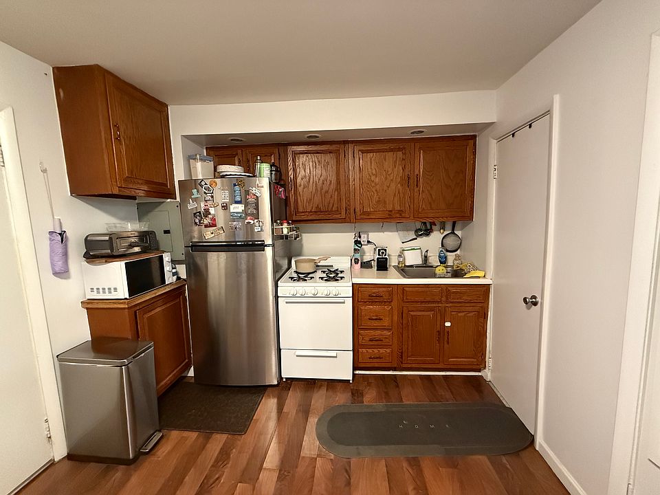 Kitchen with new stainless steel fridge