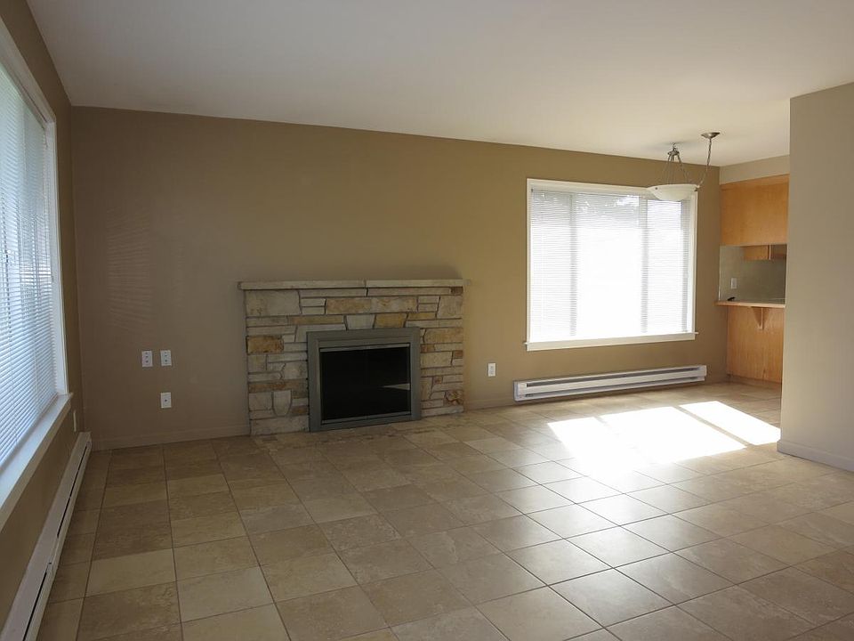 Living area upstairs with fireplace