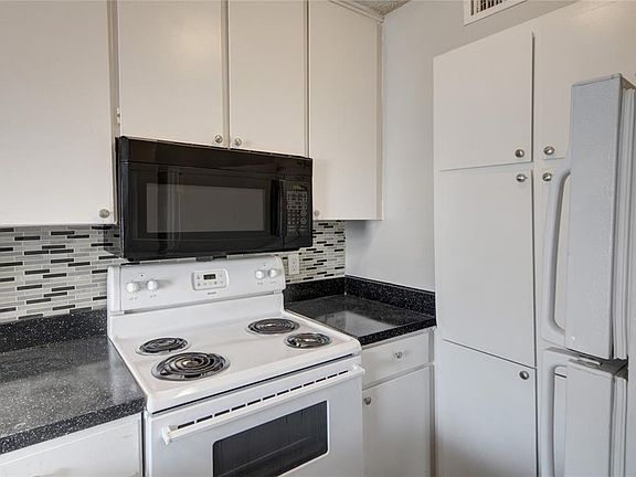 ANOTHER VIEW OF THE KITCHEN