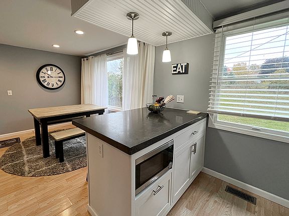 Island kitchen overlooks huge back yard