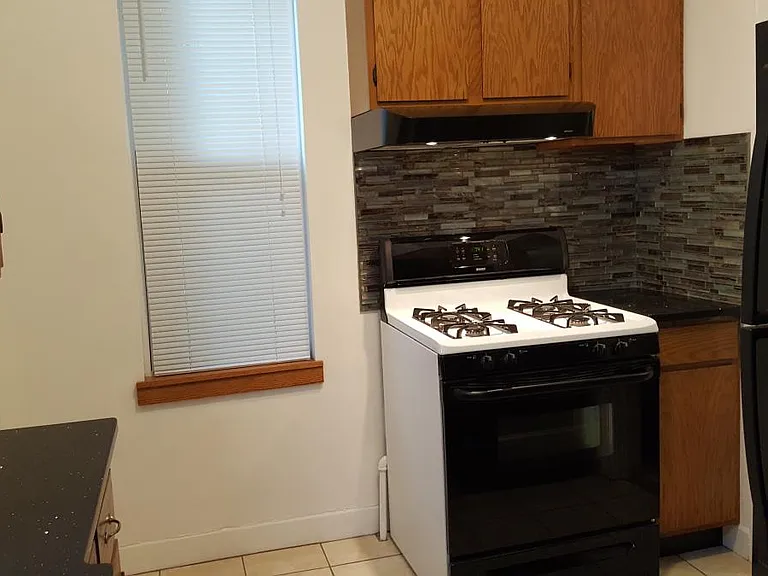 Kitchen Stove and Fridge Area