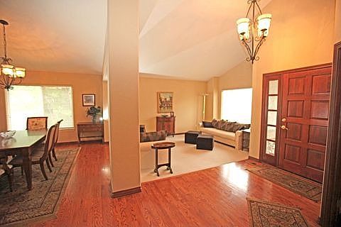 Elegant entry with hardwoods