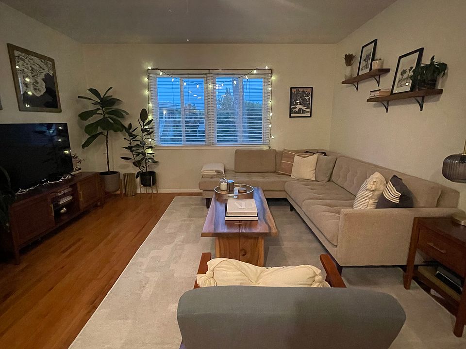 Living Room Face to South& east windows. Light & Cool Air all around!