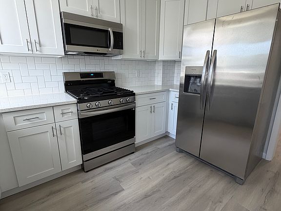 4th image of 6769 Woodley Rd
