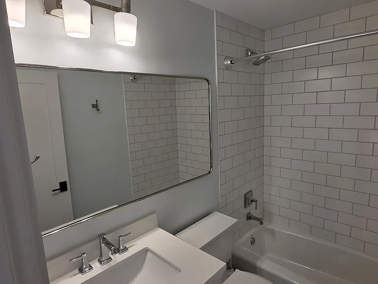 Upper floor common bathroom, middle of hallway