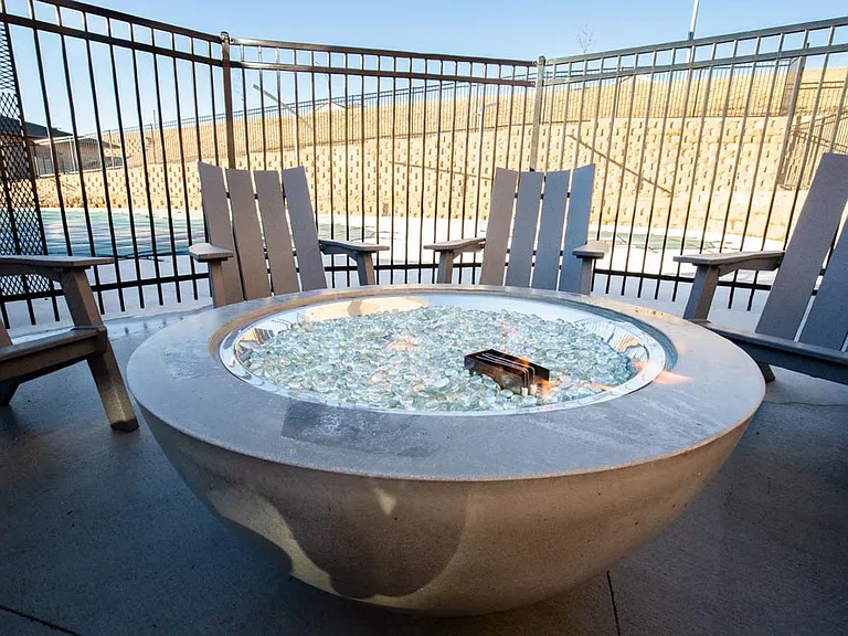 Residents love our fire pit, a feature of our new west clubhouse.