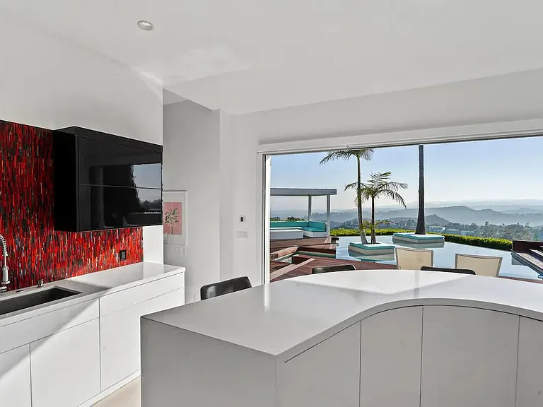Plenty of counter space in the kitchen provides an ideal setup for meal preparation and cooking experiences.