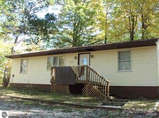 7729 Arrowhead Dr, Weidman, MI 48893