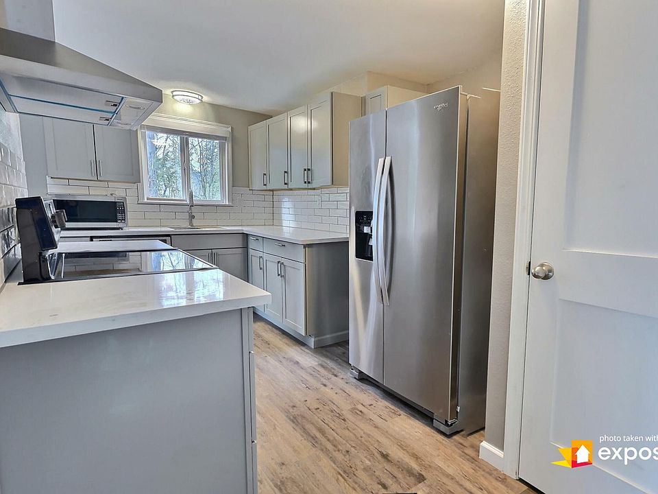 1st image of 6707 152nd Street Ct NW #1