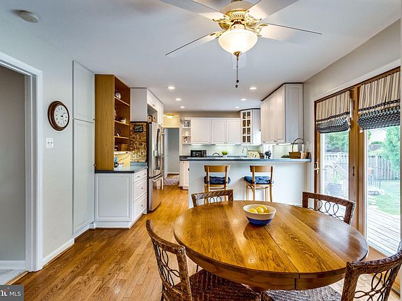 Breakfast area with lots of light and a pool view.
