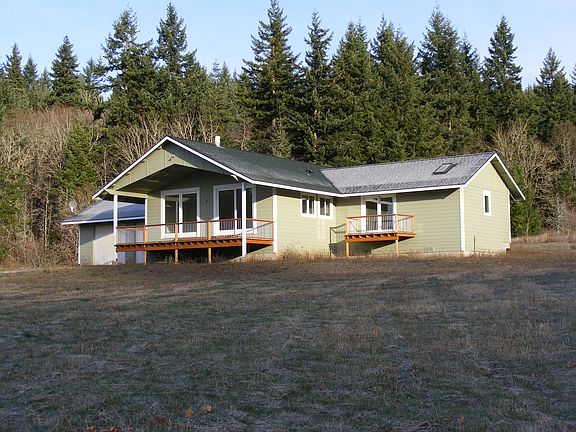 This is the house. The far left is the oversize garage with two overhead doors.
