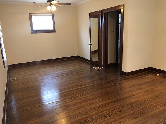 Living room facing common area hall.