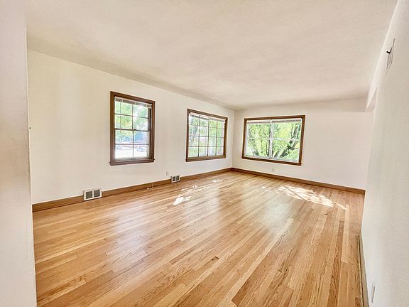 Upper and lower units are the same. Pictured here: Upper Large Living Space with tons of natural light
