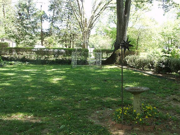 Wonderful side yard with gazebo..