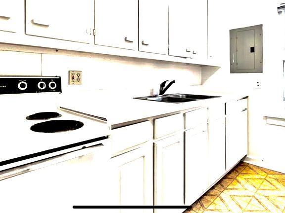Open Kitchen - Backdoor access to Patio