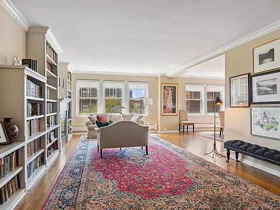 The living room flows seamlessly into the dining r