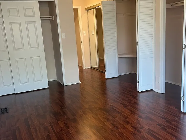 The oversized primary suite features an exceptional wall of closets_offering storage rarely found in comparable Concordia rentals_plus an updated en-suite bathroom.