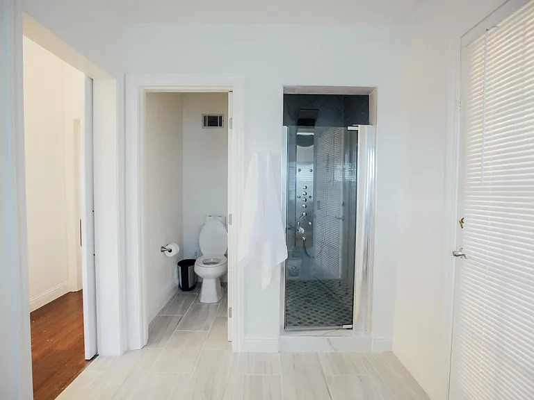 master bathroom, toilet and shower