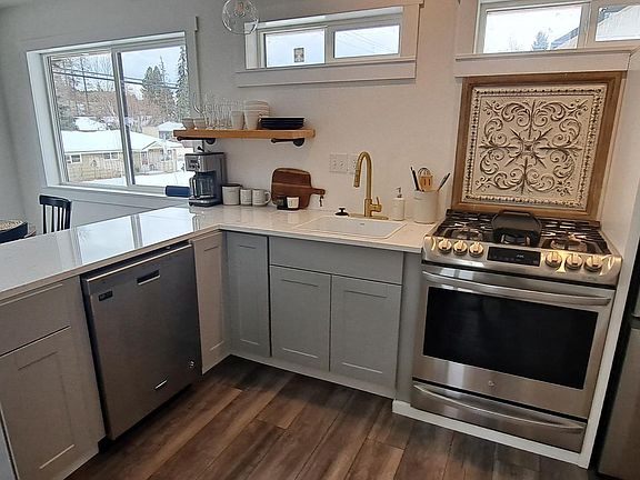Brand new appliances , Stove, dish washer and full size fridge, coffee machine, blender, toaster, microwave.