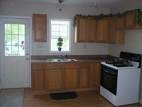 New cabinets, floor   all appliances stay