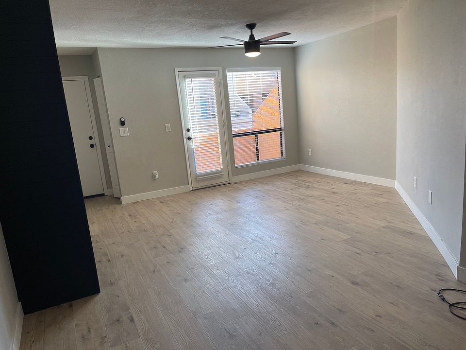 Veiw from dining area into living room and front door.