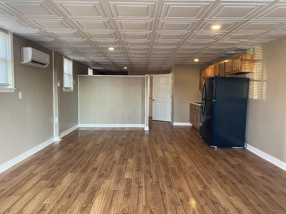 View from Front Door - New Flooring, Paint, HVAC, Stove, Kitchen Counter, Kitchen Sink, Bath Vanity, Toilet, Mirror